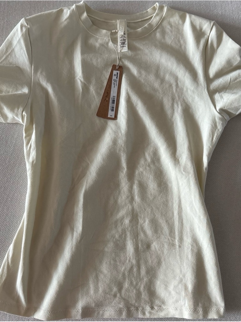 Sold out NWT Skims Cotton Jersey Basic Crew Neck Tee in Cream Bone Size M